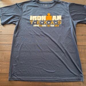 Iron Man Navy Short Sleeve Performance Tee with Orange Logo
